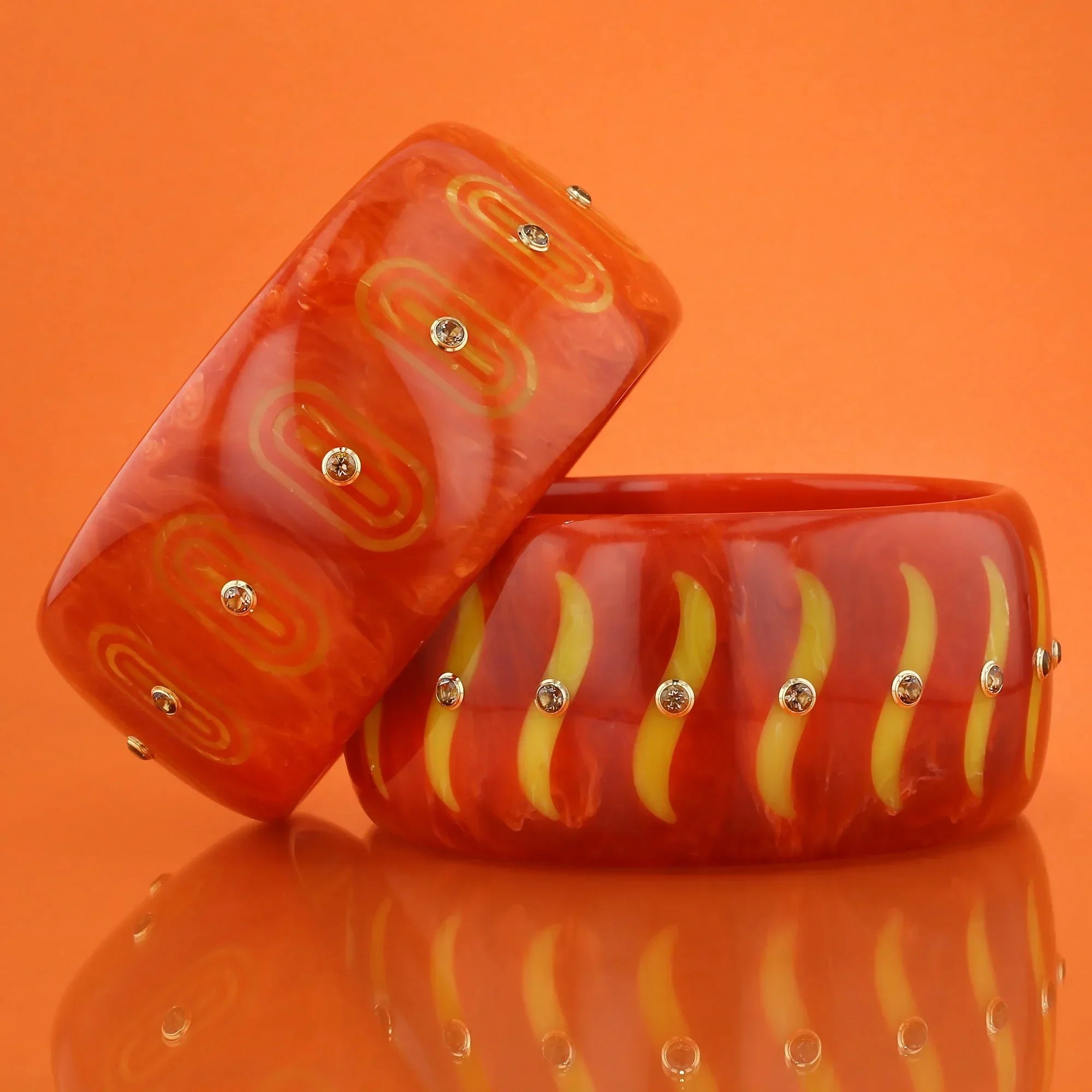 Bliss Bangle | Deep orange bakelite with inlay and stones.