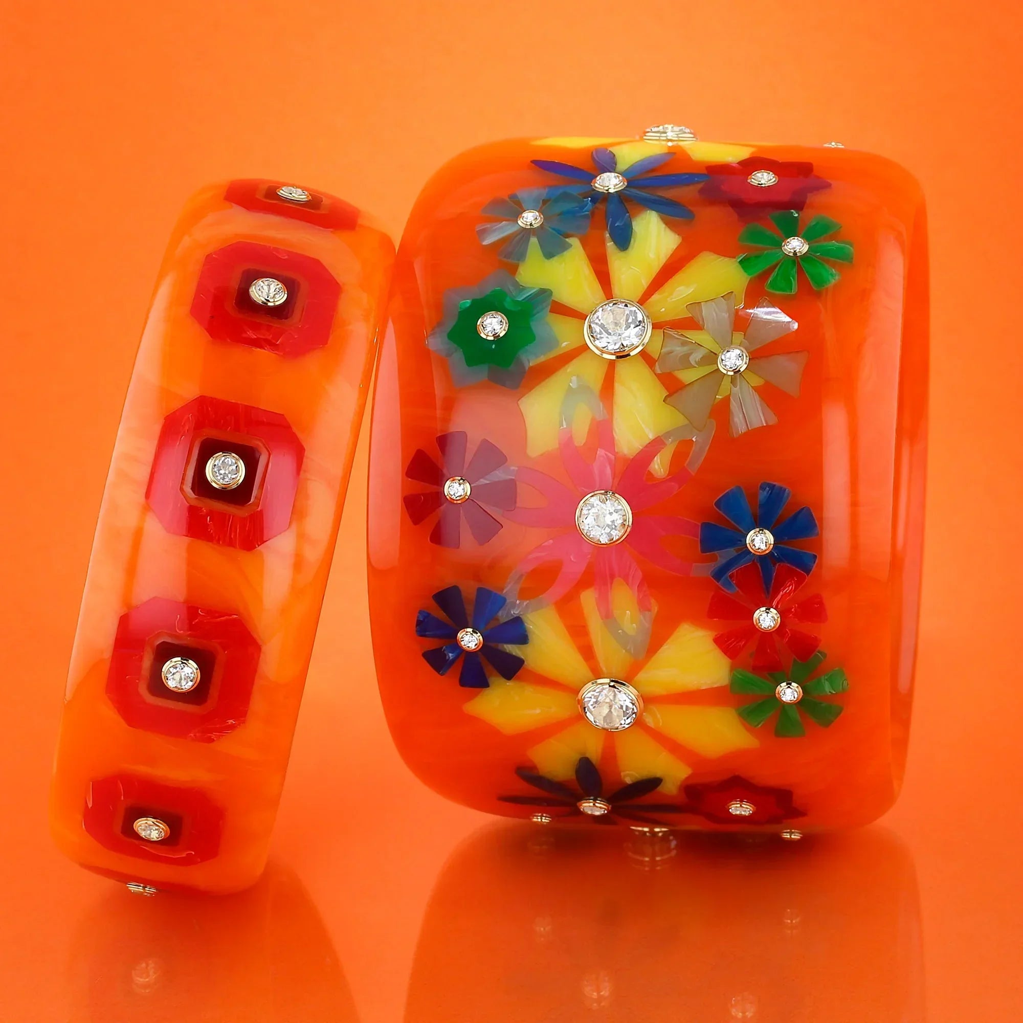 Bluma Bangle | Saturated orange bakelite with inlay and stones.