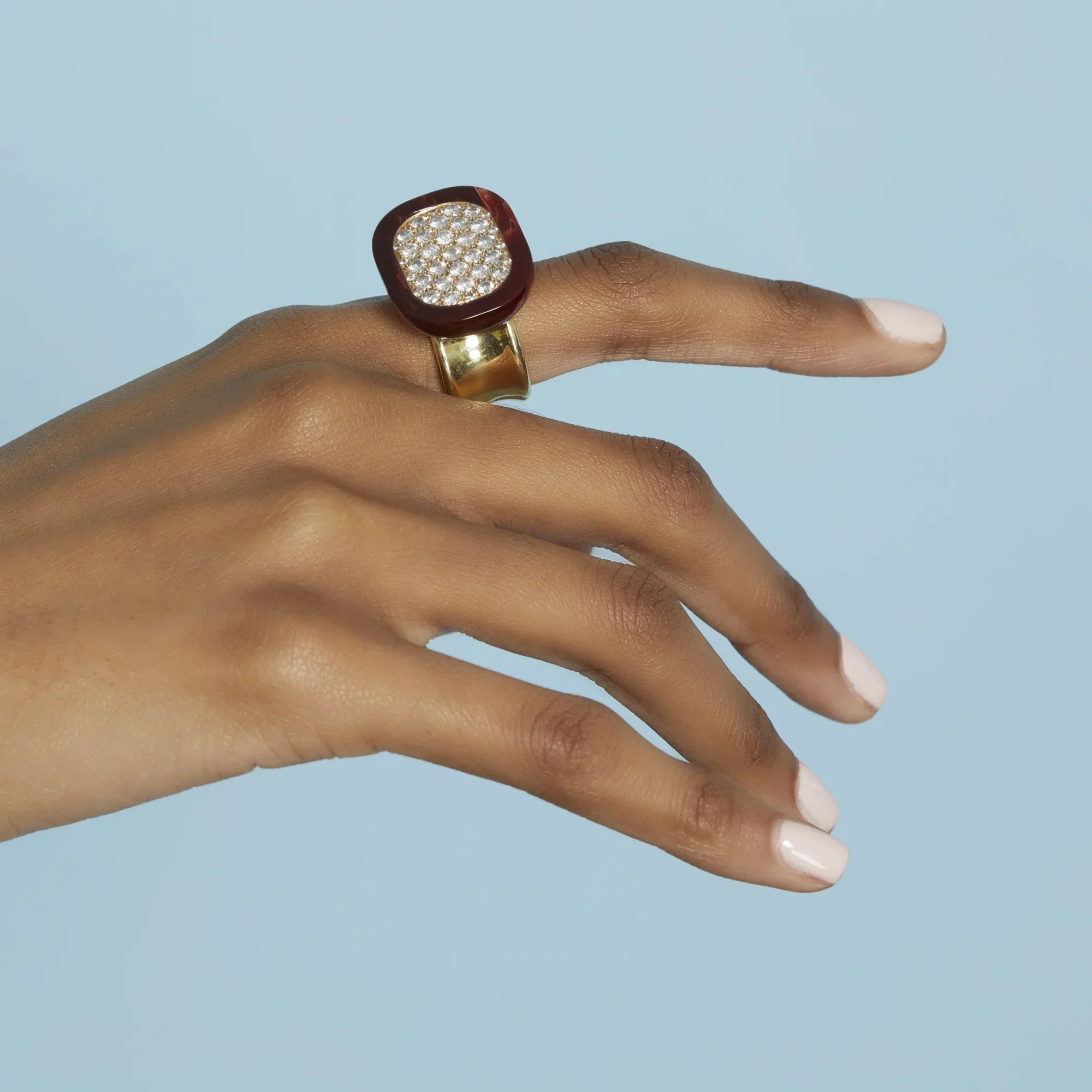 Celine Ring | Gold band ring with diamonds surrounded by bakelite.
