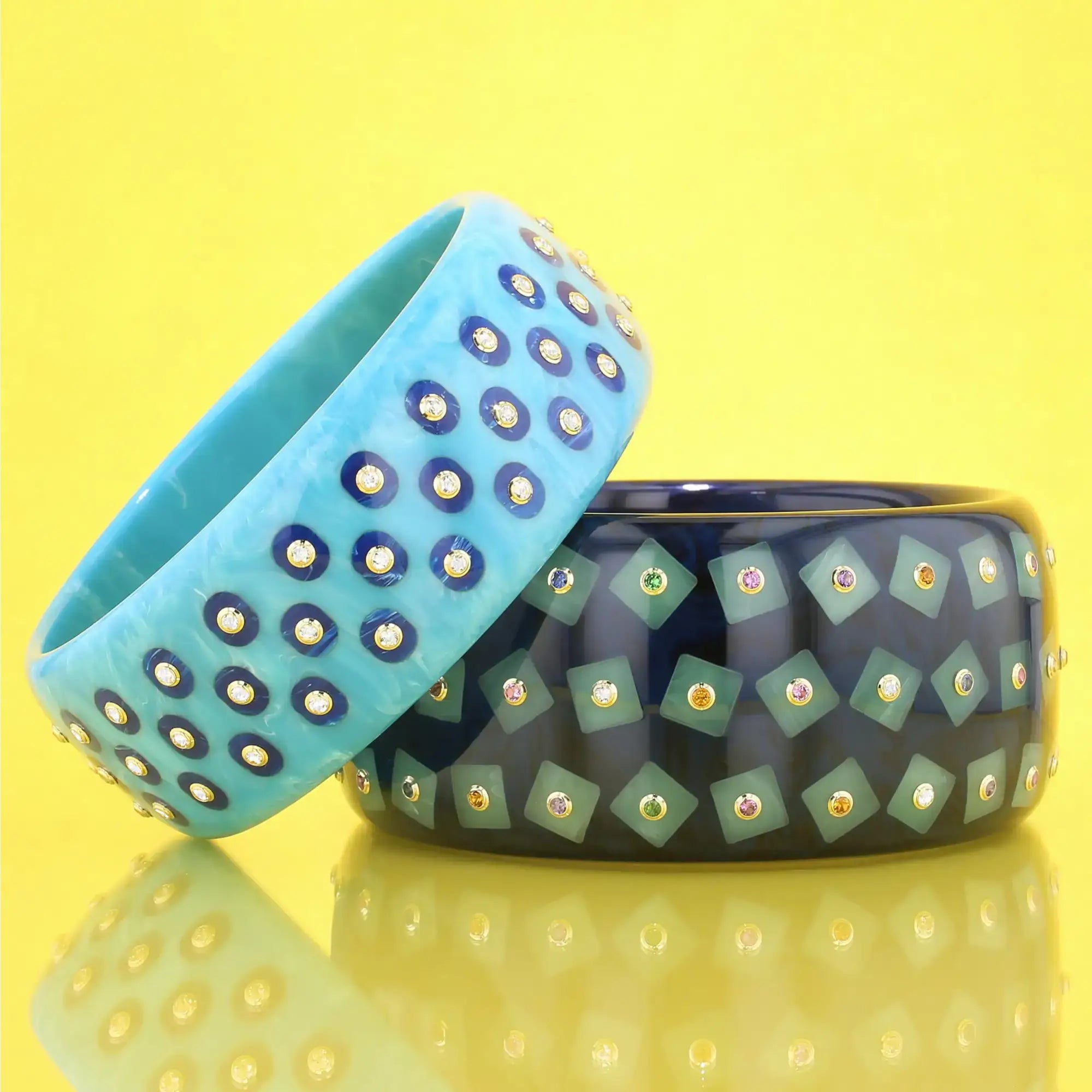 Lynn Bangle | Indigo bakelite with inlay and stones.