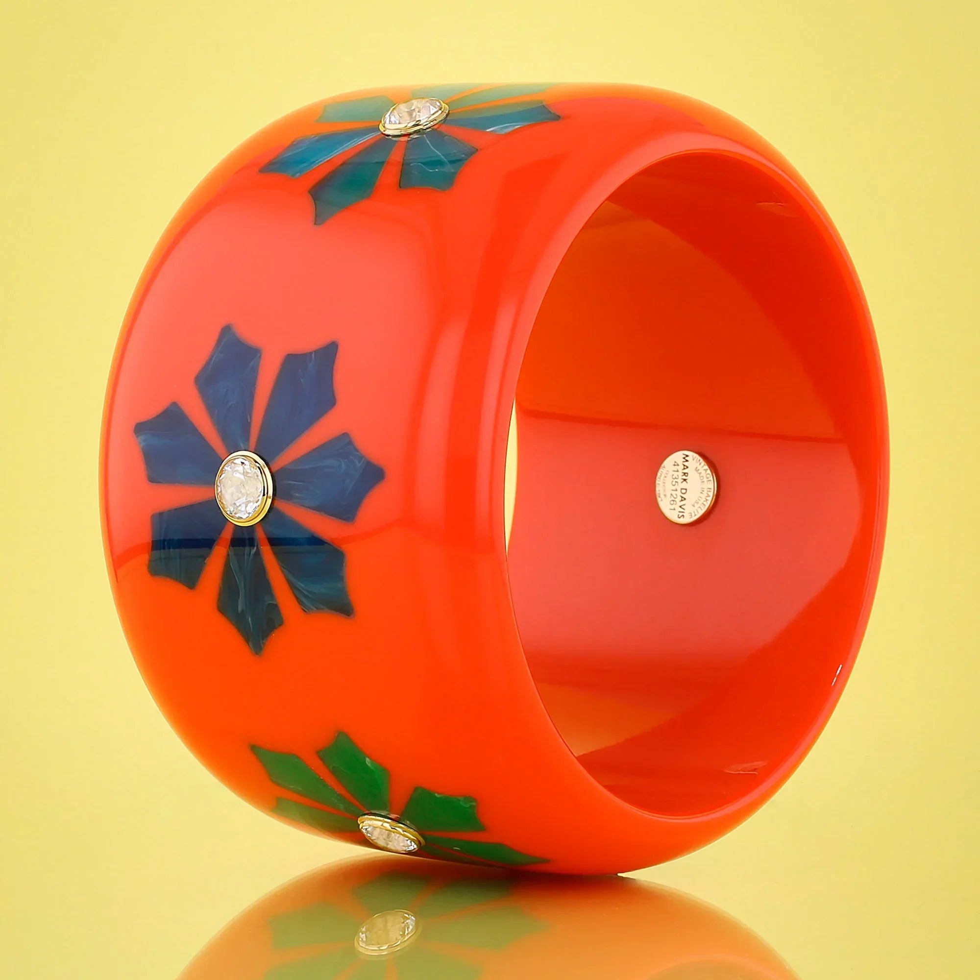 Lyra Bangle | Vibrant orange bakelite with inlay and stones.
