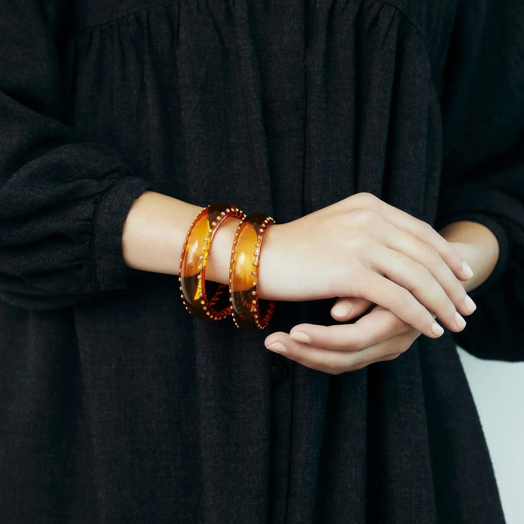 Nicole Bangle | Bakelite bangle with stones that exudes beautiful simplicity.