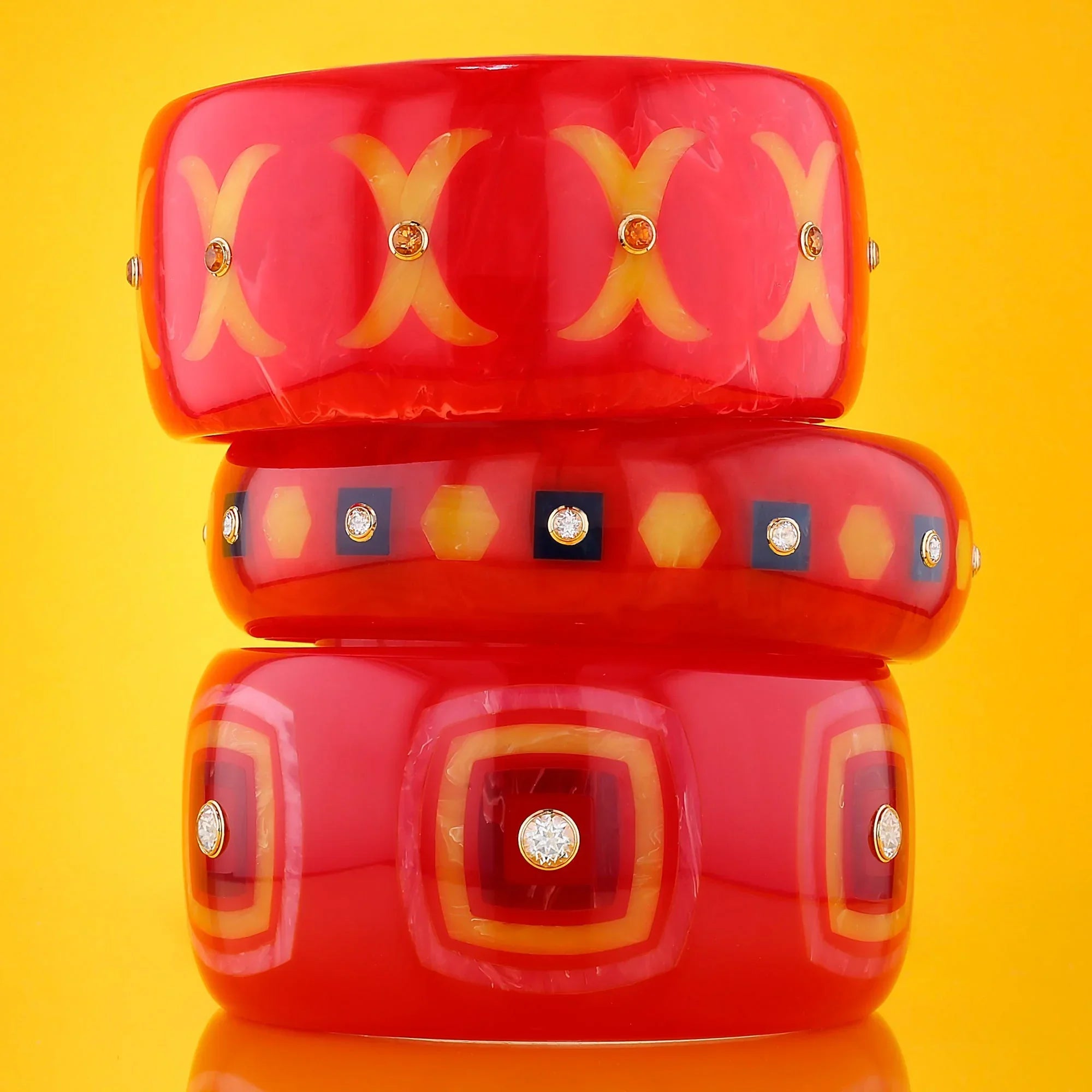 Tierney Bangle | Tart red bakelite with inlay and stones.