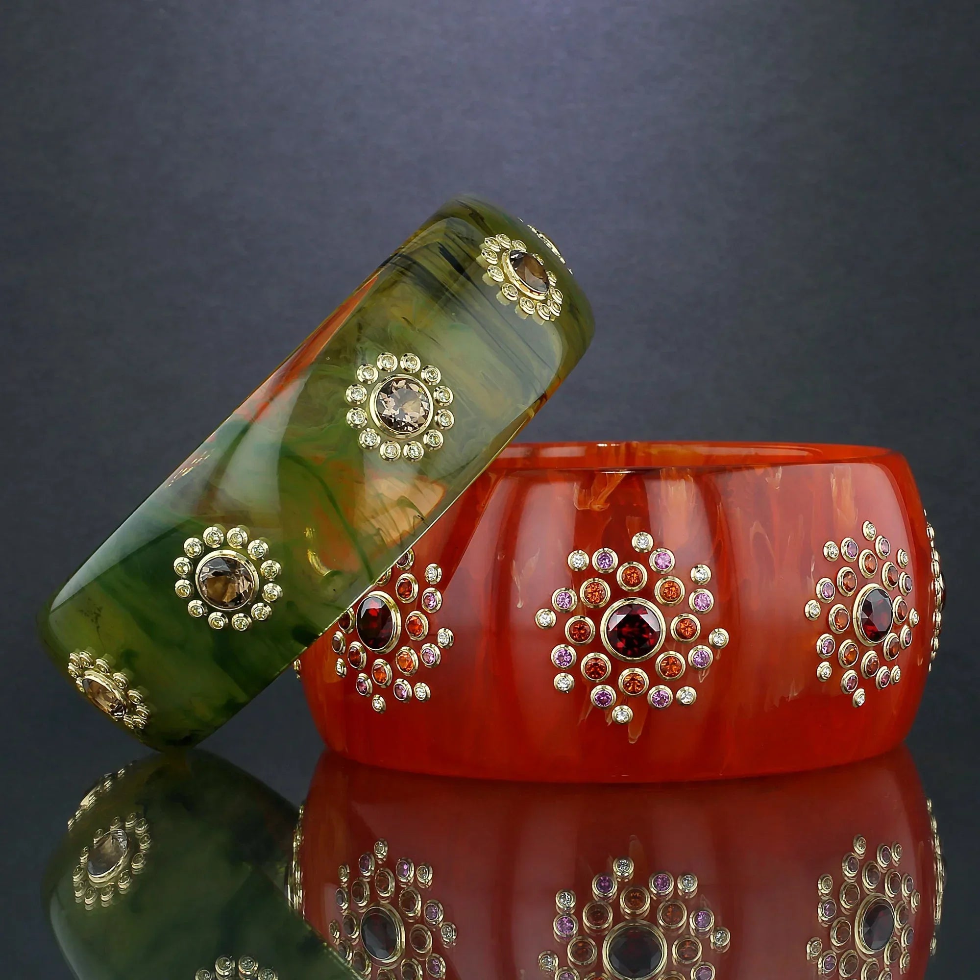 Vera Bangle | Vivid orange bakelite with stones.