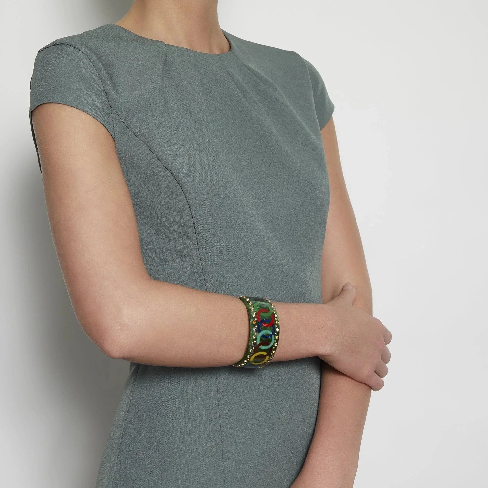 Alessia Bangle | Bakelite bangle with interlocking rings inlay and stones.