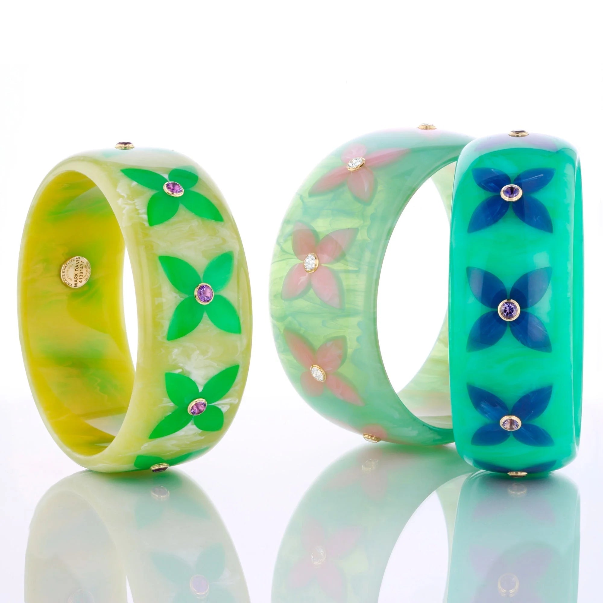 Alyssa Bangle | Light hearted bakelite with stylized floral inlay and stones.