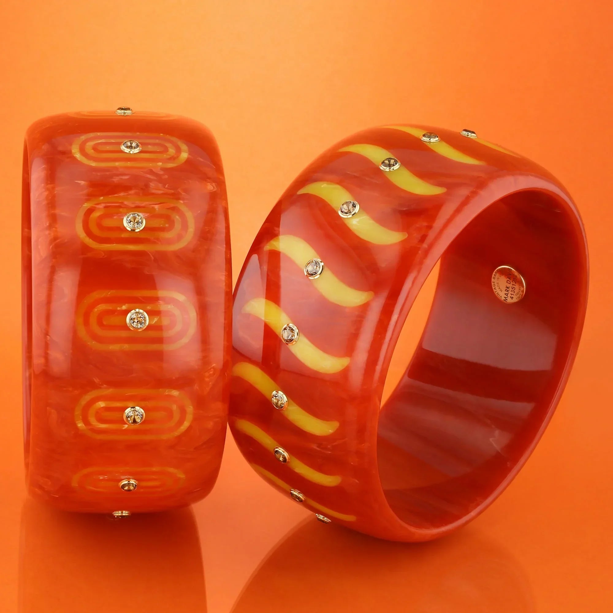 Bliss Bangle | Deep orange bakelite with inlay and stones.