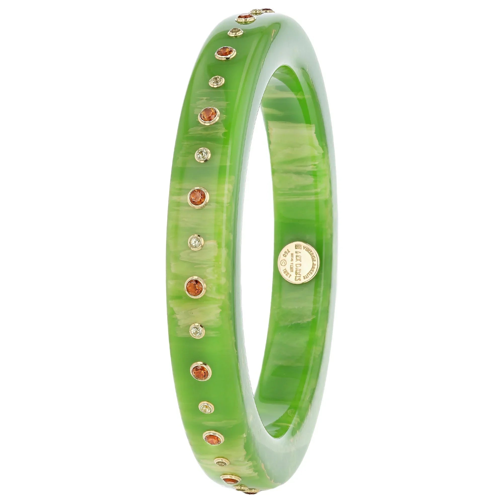 Iris Bangle | Bakelite with a simple straight line pattern of stones.