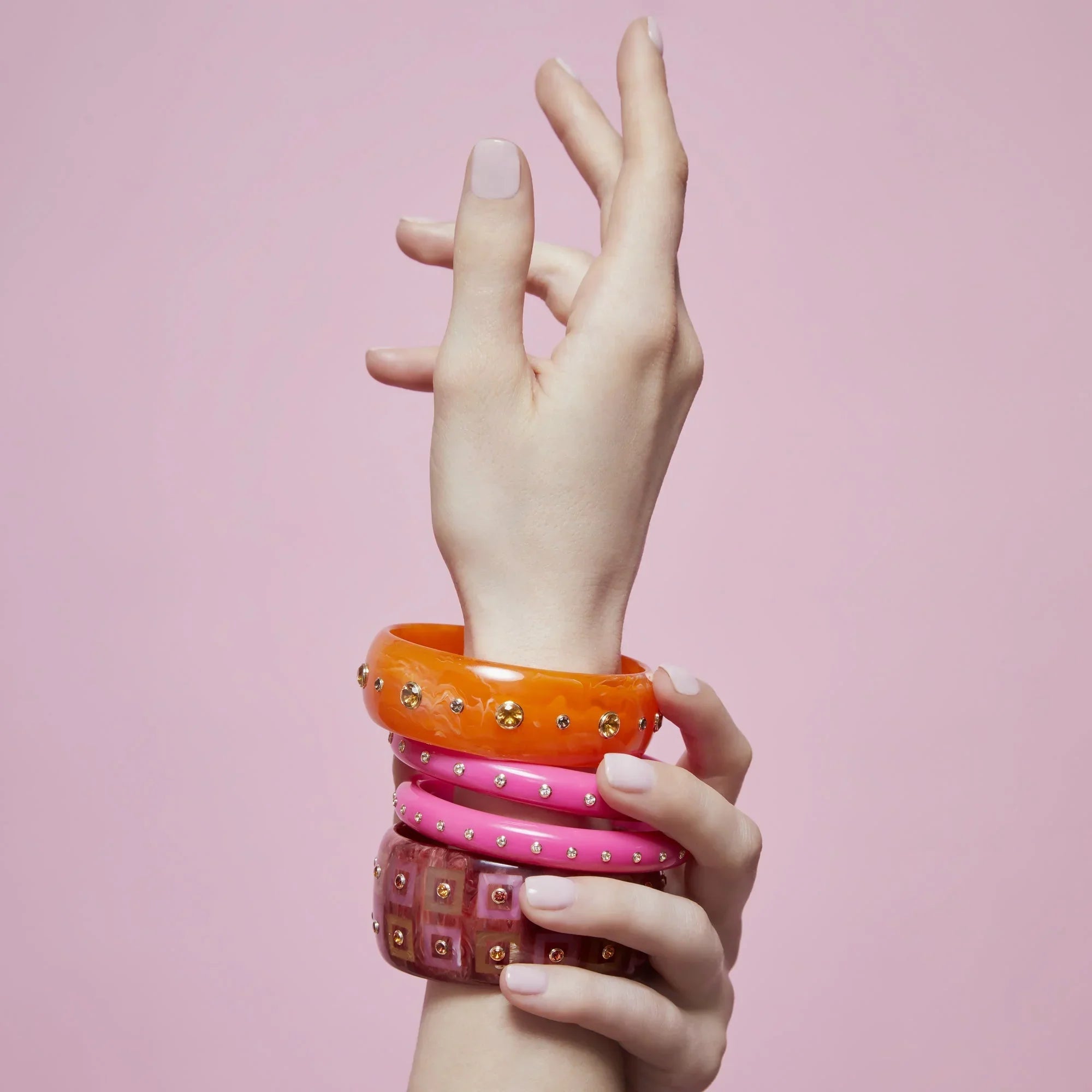 Iris Bangle | Marbled orange bakelite with stones.