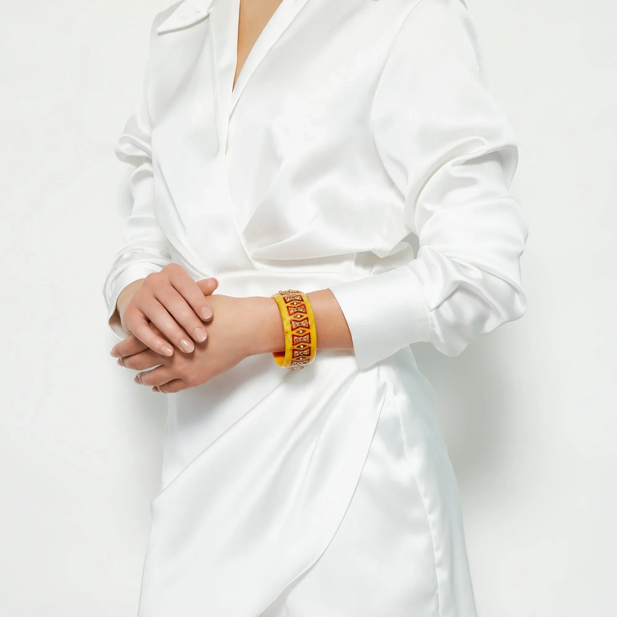 Kalina Bangle | Bakelite with bow pattern inlay and stones.