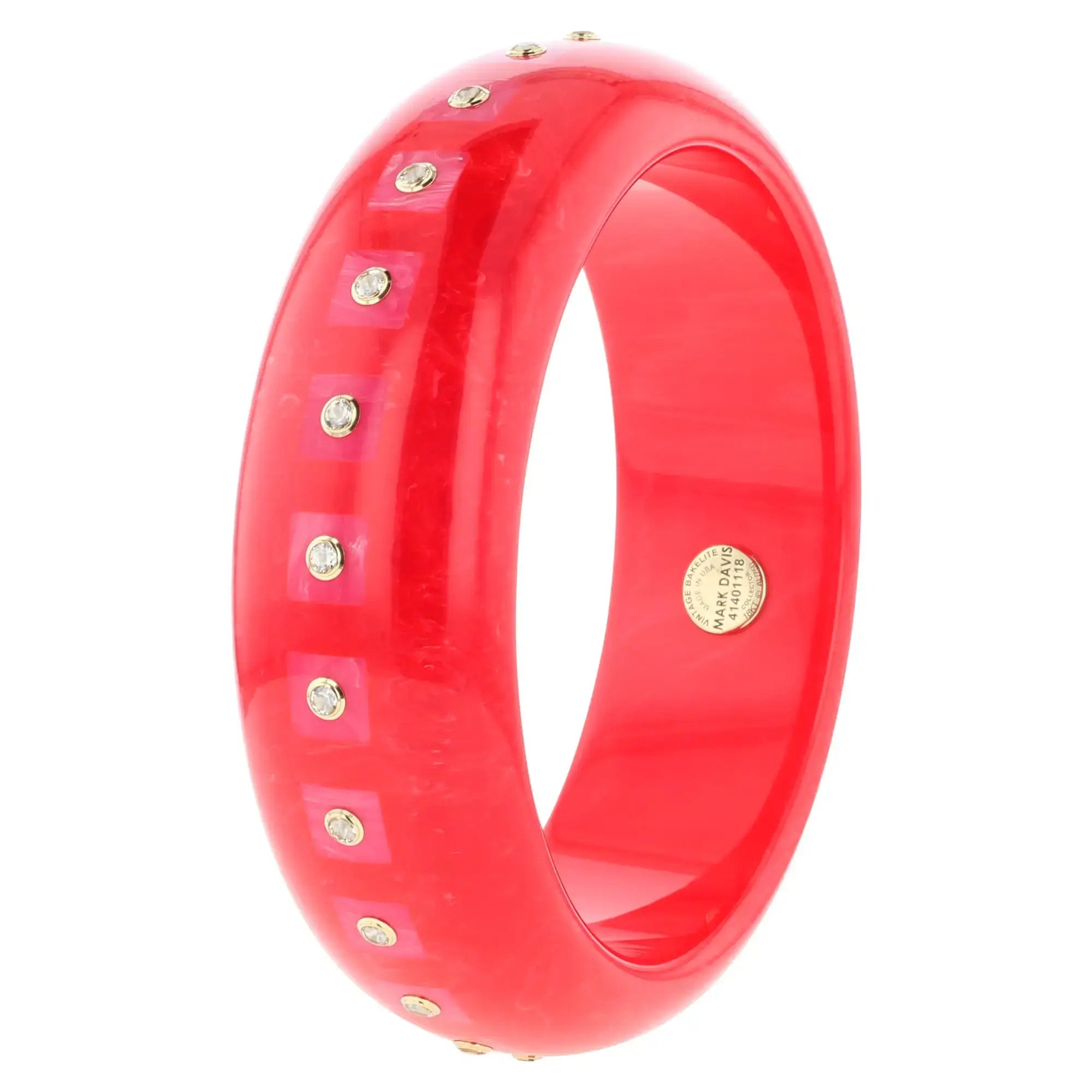 Katherine Bangle | Tart red bakelite with inlay and stones.