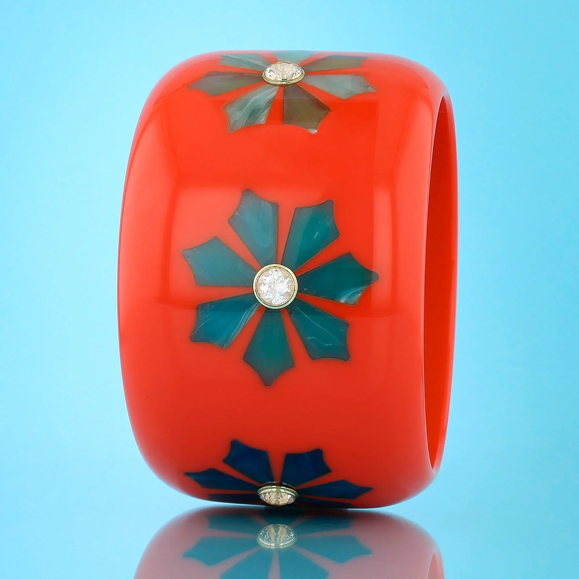 Lyra Bangle | Vibrant orange bakelite with inlay and stones.