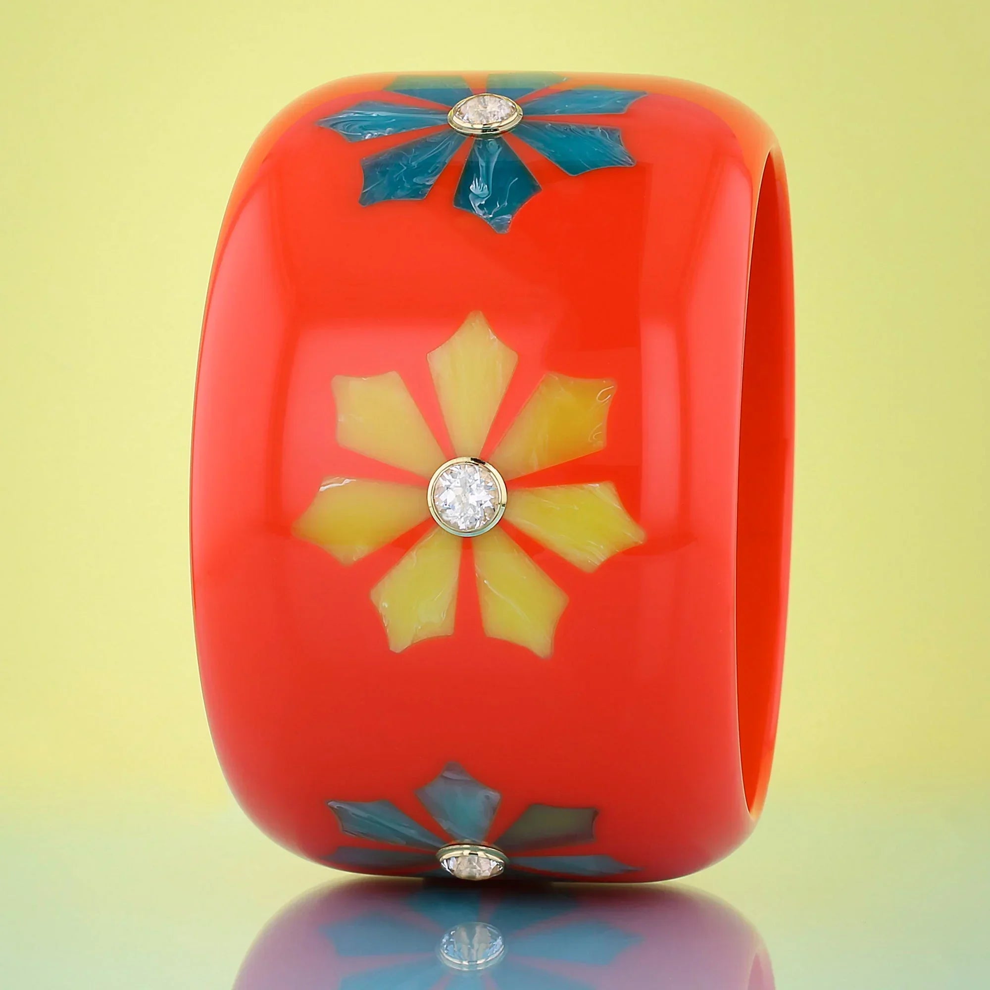Lyra Bangle | Vibrant orange bakelite with inlay and stones.