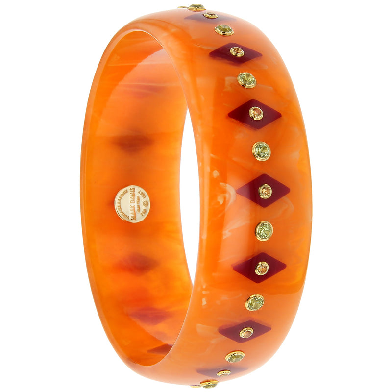 Penelope Bangle | Bakelite bangle inlaid with lozenge shapes, includes stones.