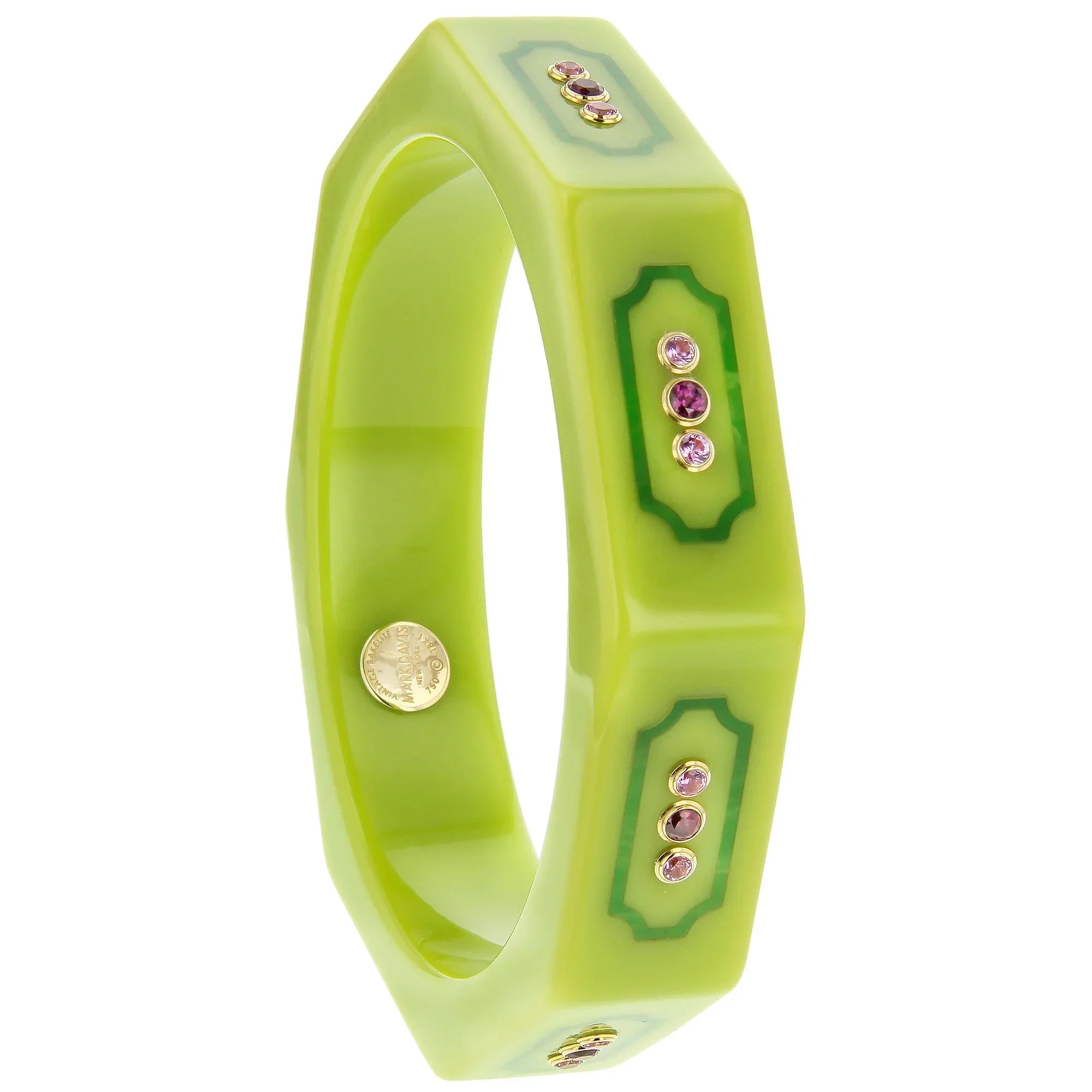 Rowan Bangle | Bakelite bangle 
with inlaid frames, framing the stones.