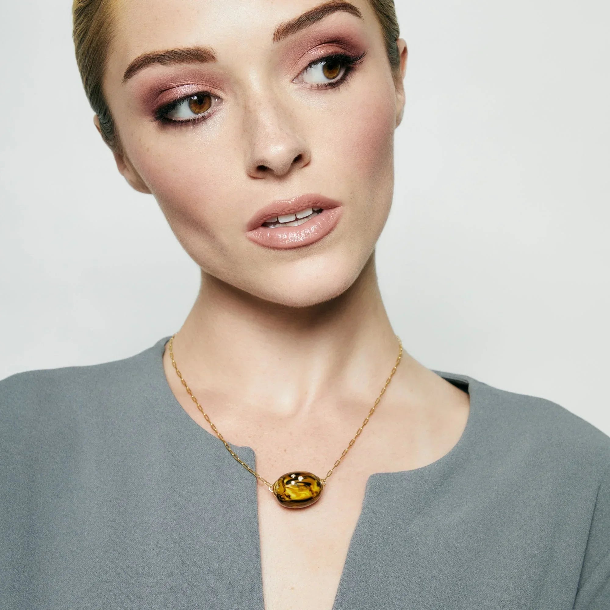 Sutton Necklace | Artful bakelite pendant with stones and a chain.