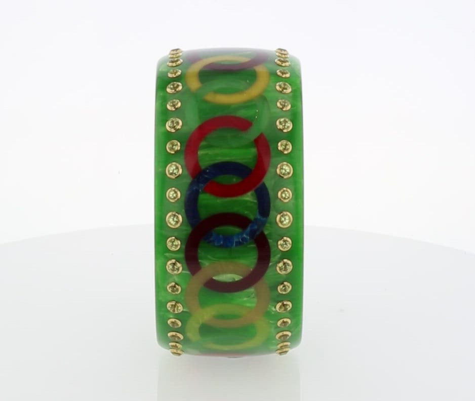 Alessia Bangle | Bakelite with endless chain design inlay and stones.