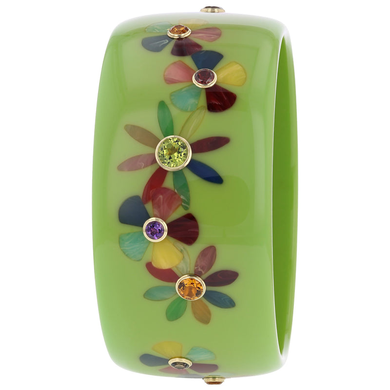 June Bangle | Bakelite bangles with mosaic flowers inlaid and stones.